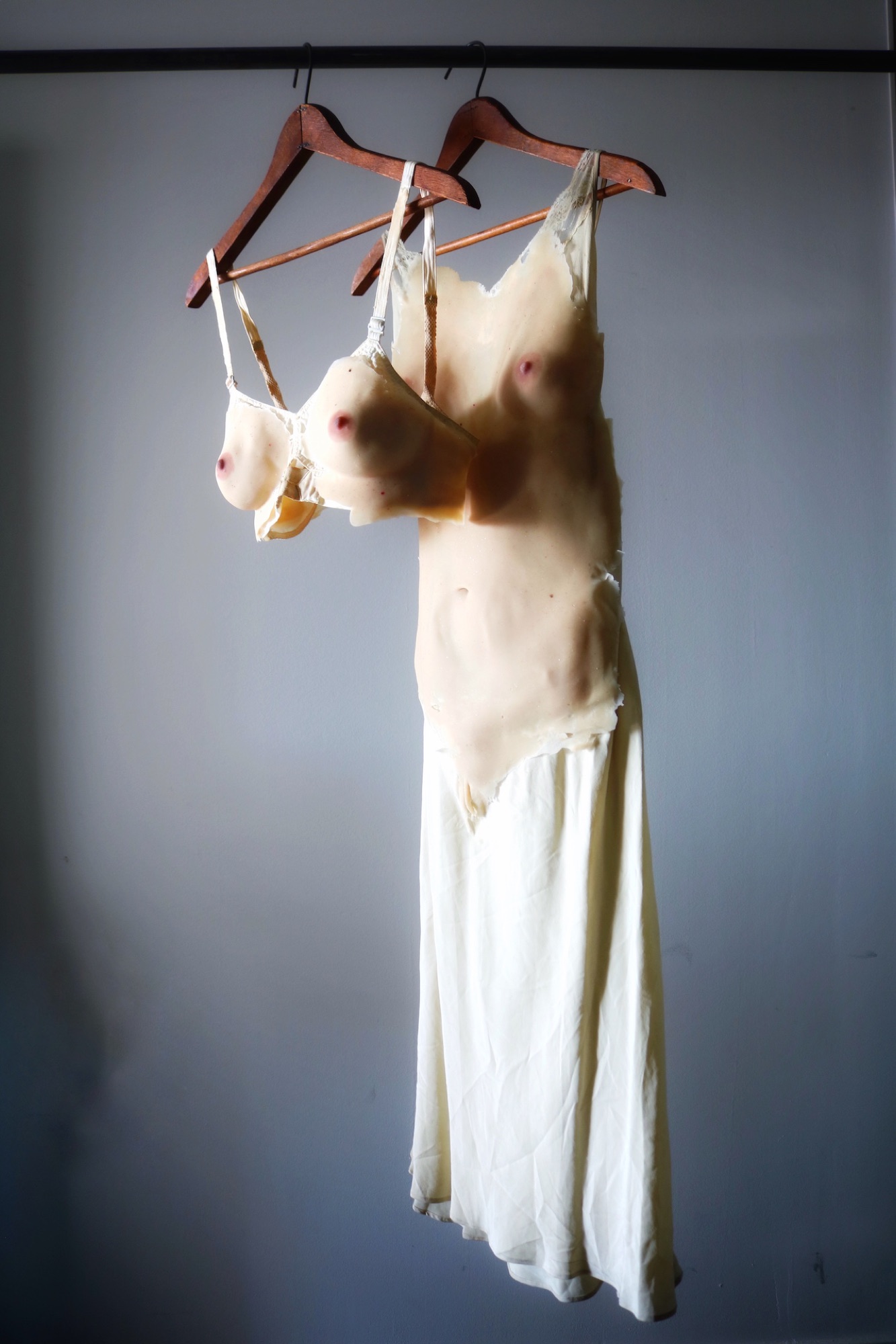 The nightgown and the cast bra hanging together